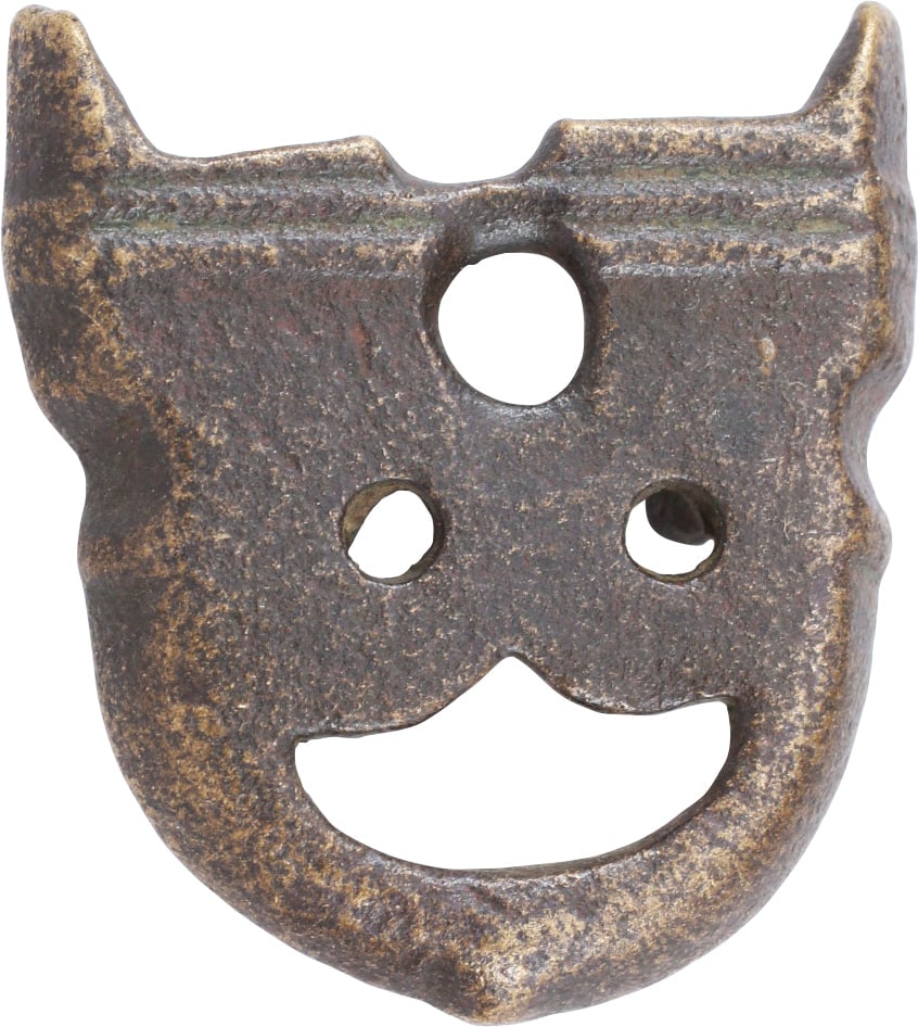 ROMAN LEGIONARIES DAGGER SCABBARD MOUNT, 1st-3rd CENTURY AD: 1st-3rd cent AD. Bronze chappe, the tip mount of vase form pierced with circles and a crescent, suggesting a human face. Abstracted but unmistakable. Just under 1 1/8" in height with mounting lugs to