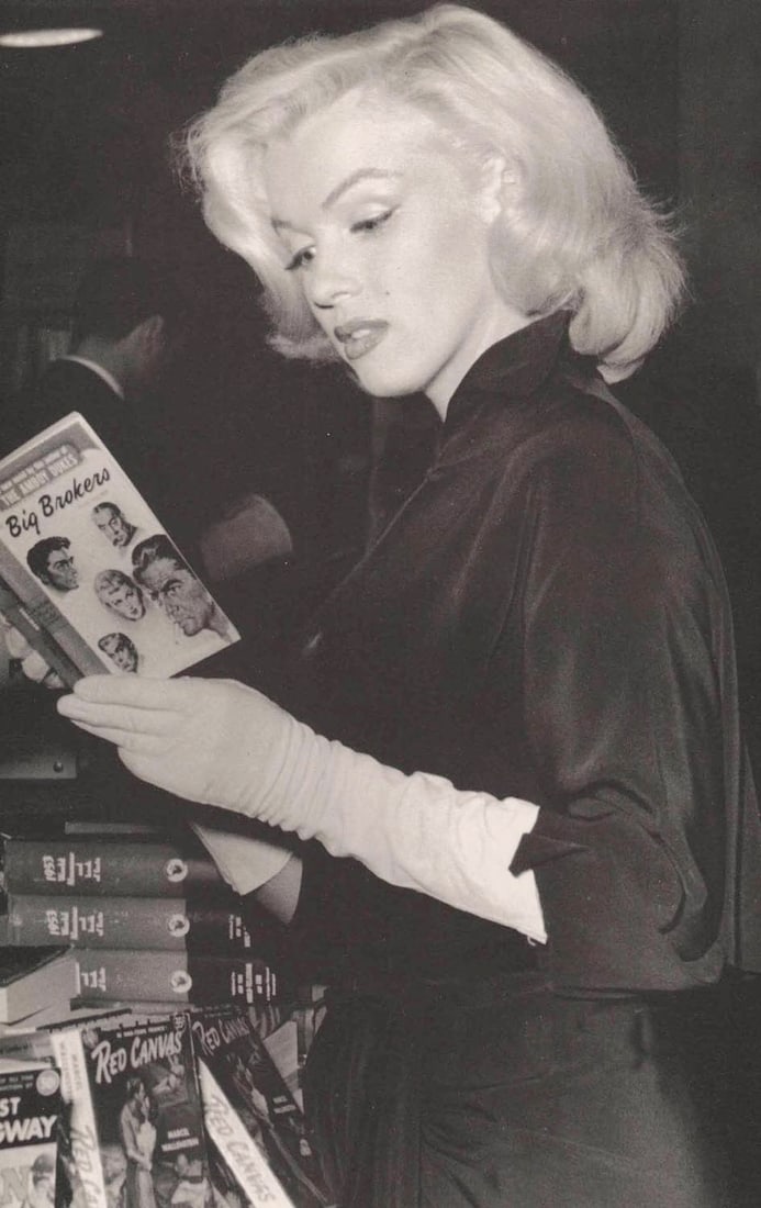 ANDRE DE DIENES - Marilyn Monroe (Norma Jean) (reading): Artist: ANDRE DE DIENES Print Title: Marilyn Monroe (Norma Jean) Medium: Photo-lithograph Printed 1990’s in Singapore Image size (inches) approx. 12 x 7.5” Andre De Dienes De Dienes was a