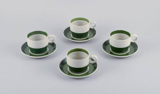 Stig Lindberg for Gustavsberg, Sweden, a set of four "Bodega" stoneware coffee cups with: Stig Lindberg for Gustavsberg, Sweden, a set of four "Bodega" stoneware coffee cups with saucers.Produced from 1972-1977.Perfect condition.Marked.Cup: 7.6 cm in diameter without handle x 6.0 cm in hei