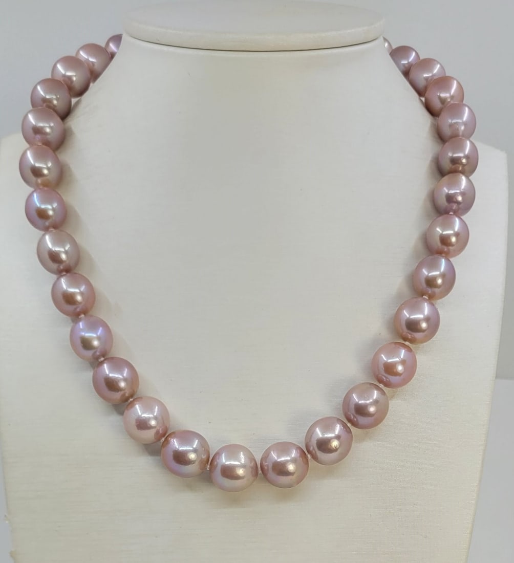 Necklace Big Size - 11x13.5mm Pink Edison Pearls: Title: Necklace Big Size - 11x13.5mm Pink Edison Pearls Description: This necklace will stand out for its radiant glow ! Most freshwater pearls are nucleated by tissue, but Edison cultured pearls are 