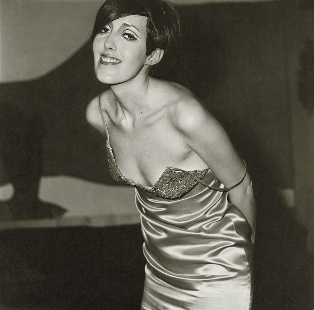 DIANE ARBUS - Girl in a Shiny Dress, NYC, 1967: Artist: Diane Arbus Title: Girl in a Shiny Dress, NYC, 1967 Medium: Photo Litho, 1997, Italy Dimensions: 8.3x8.15" Description: Heat Wax Mounted on 11x14" Conservation Board Artist Bio: Diane Arbus wa