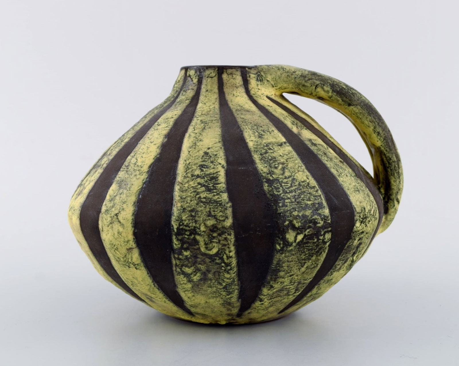 European studio ceramicist. Unique retro vase with handle in glazed ceramics. Black / yellow striped (1 of 7)