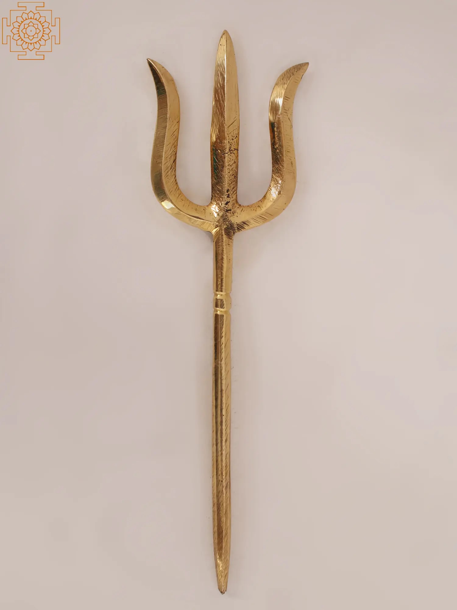 Ritual Brass Trishul: Title: Ritual Brass Trishul Description: Brass Height: 7.00 inch Width: 2.00 inch Depth: 1.00 inch Weight: 45 gm Additional Information: The turtle, or Kurma, is a revered symbol in Hindu culture. Lor