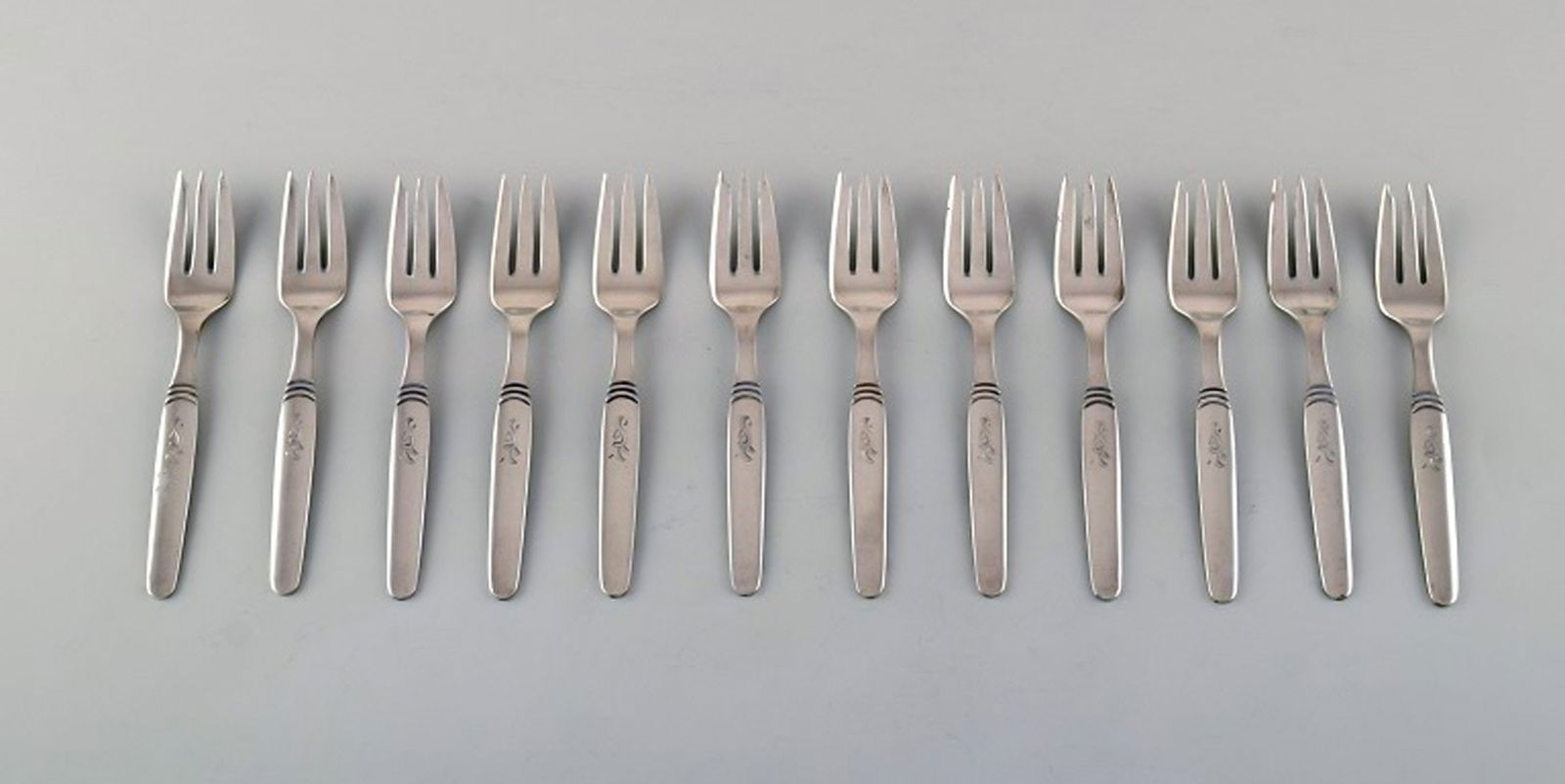 Hans Hansen silver cutlery number 16. Twelve art deco pastry forks in silver (830). Dated 1942.: Title: Hans Hansen silver cutlery number 16. Twelve art deco pastry forks in silver (830). Dated 1942. Description: Hans Hansen silver cutlery number 16. Twelve art deco pastry forks in silver (830).