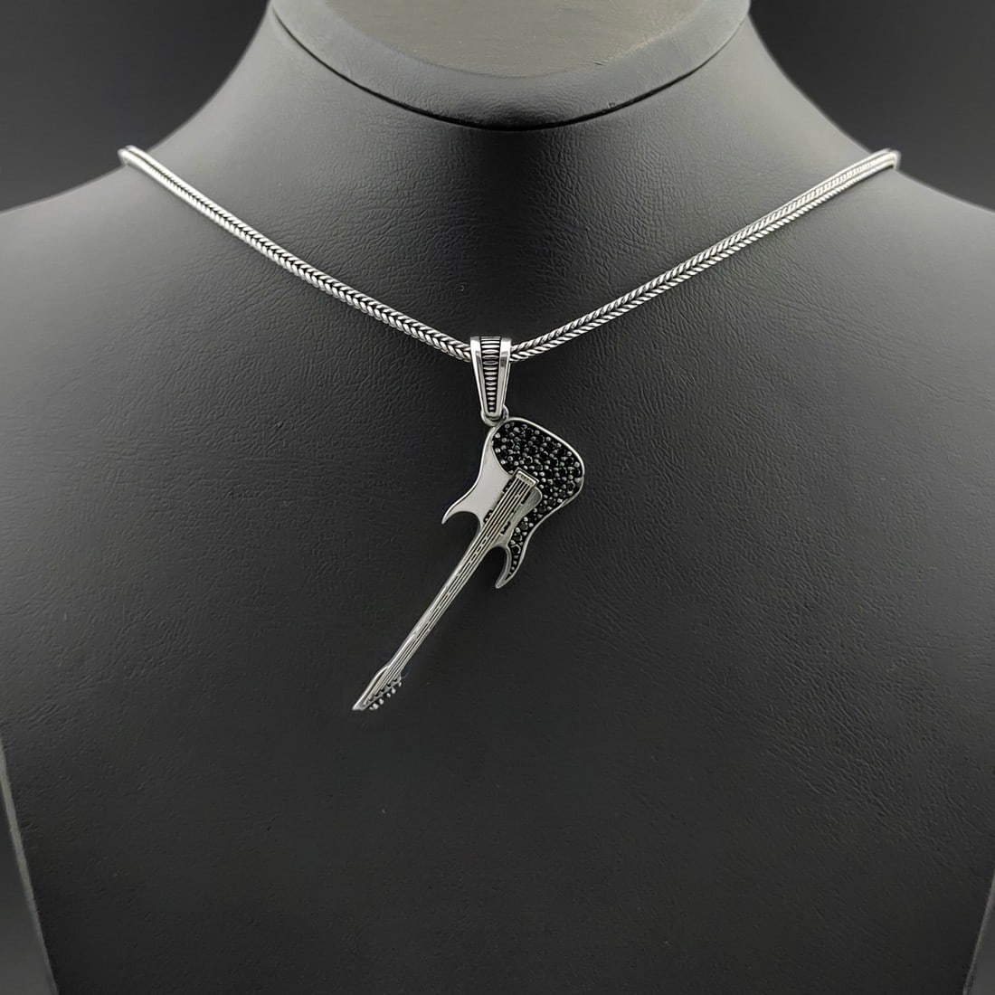 925 Silver Chain with Guitar Pendant: Title: 925 Silver Chain with Guitar Pendant Description: 925 Silver Chain with Guitar Pendant -Total Weight:14.5g -Size: Chain Size: 23.62 in(60cm). Pendant Size:1.73x0.94in (44x24mm) (Bail included).