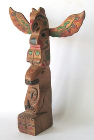 Vintage N W Coast tourist trade totem pole.