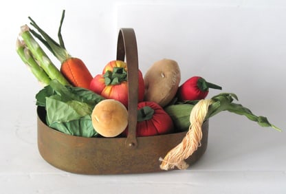 Collection of miniature fabric vegetables.