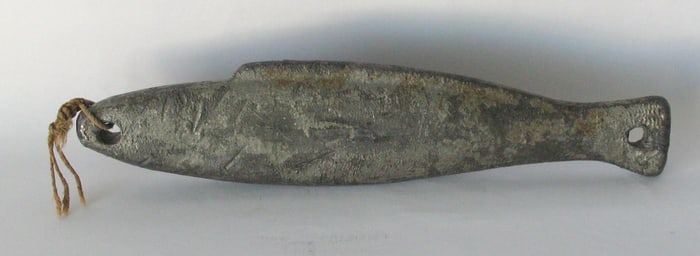 Antiques cast lead fishing net weight.