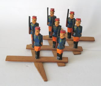 Antique folk art wood mechanical soldier toy.