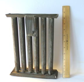 Antique tinsmith made candle mold.