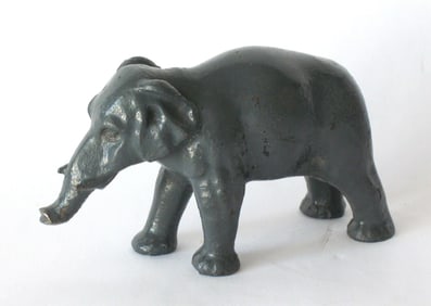 Antique cast iron elephant paper weight.