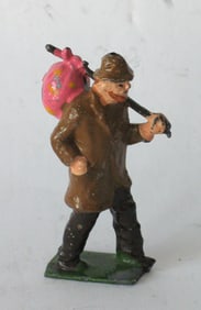 Vintage cast metal Hobo figure paper weight.