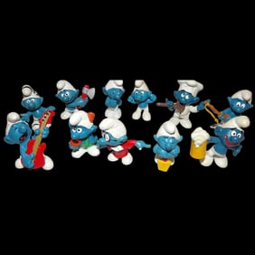 Eleven Vintage Smurf Figurines