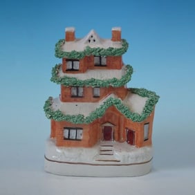 Kent Staffordshire snow-covered house money box