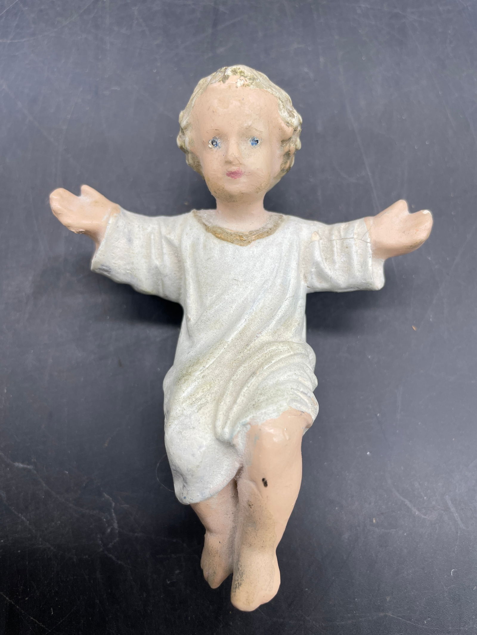 Very Old Baby Jesus Nativity Plaster or Paper Mache: Title: Very Old Baby Jesus Nativity Plaster or Paper Mache Date/Period: unknown Dimension: Approx. 3.5" Material: plaster or paper mache? Additional Information: Very Old Baby Jesus Nativity Plaster o