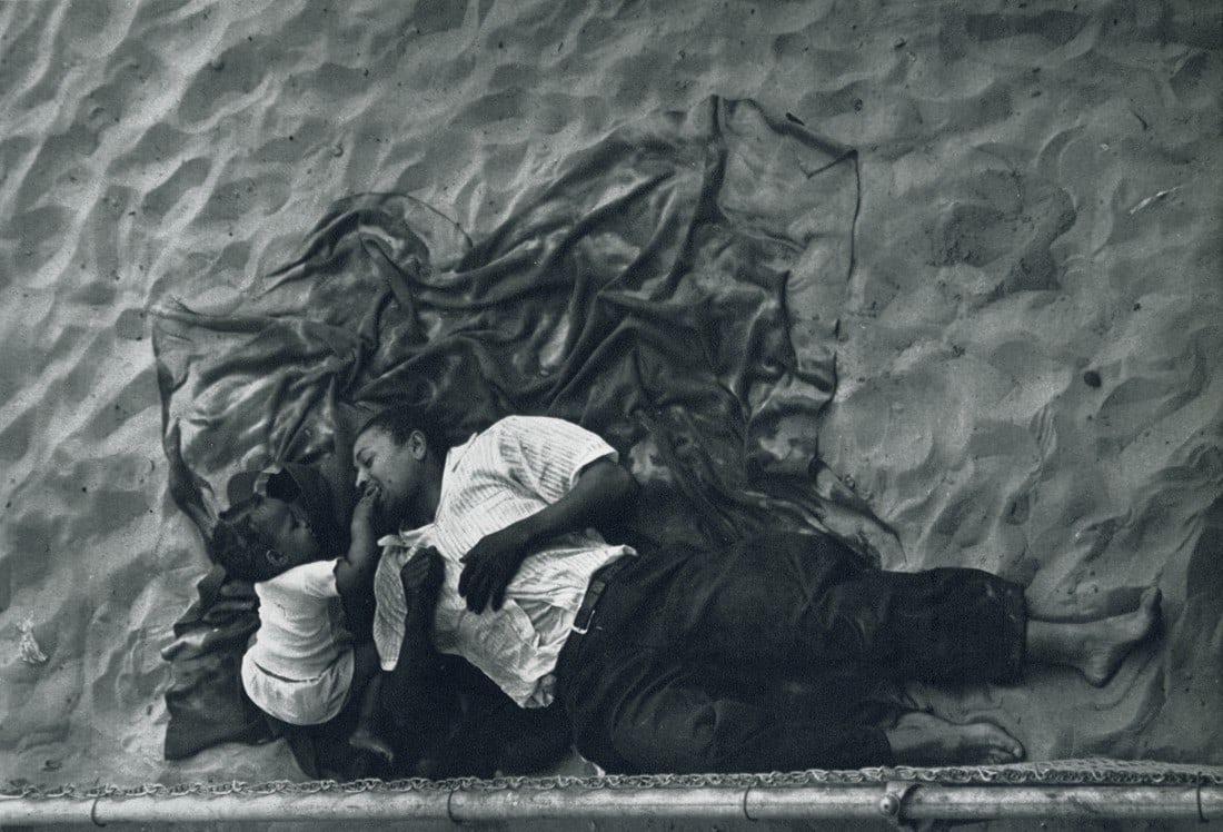 LOU BERNSTEIN - Coney Island, 1943: Artist: Lou Bernstein Title: Coney Island, 1943 Medium: Photo Litho, 1972, USA Dimensions: 8.95x6.1" Description: Heat Wax Mounted on 8.5x11" Conservation Board Artist Bio: Lou Bernstein (1911 –