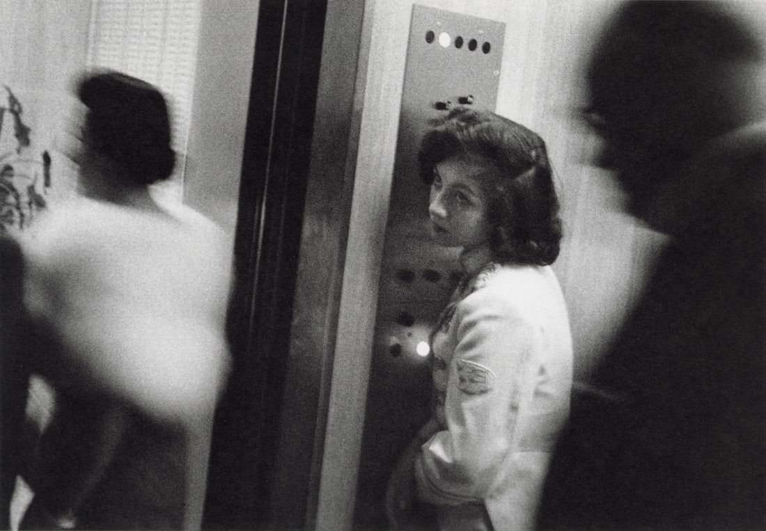 ROBERT FRANK - Elevator, Miami Beach: Artist: Robert Frank Title: Elevator, Miami Beach Medium: Photo Litho, 1993, Switzerland Dimensions: 8.4x5.85" Description: Heat Wax Mounted on 8.5x11" Conservation Board Artist Bio: Robert Frank (192