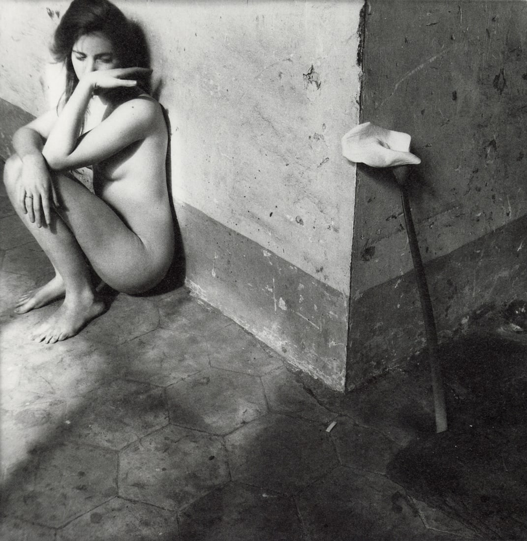 FRANCESCA WOODMAN - Corner with Lily, 1978: Artist: Francesca Woodman Title: Corner with Lily, 1978 Medium: Photo Litho, 2024, Italy Dimensions: 7.3x7.5" Description: Heat Wax Mounted on 11x14" Conservation Board Artist Bio: Francesca Stern Woo