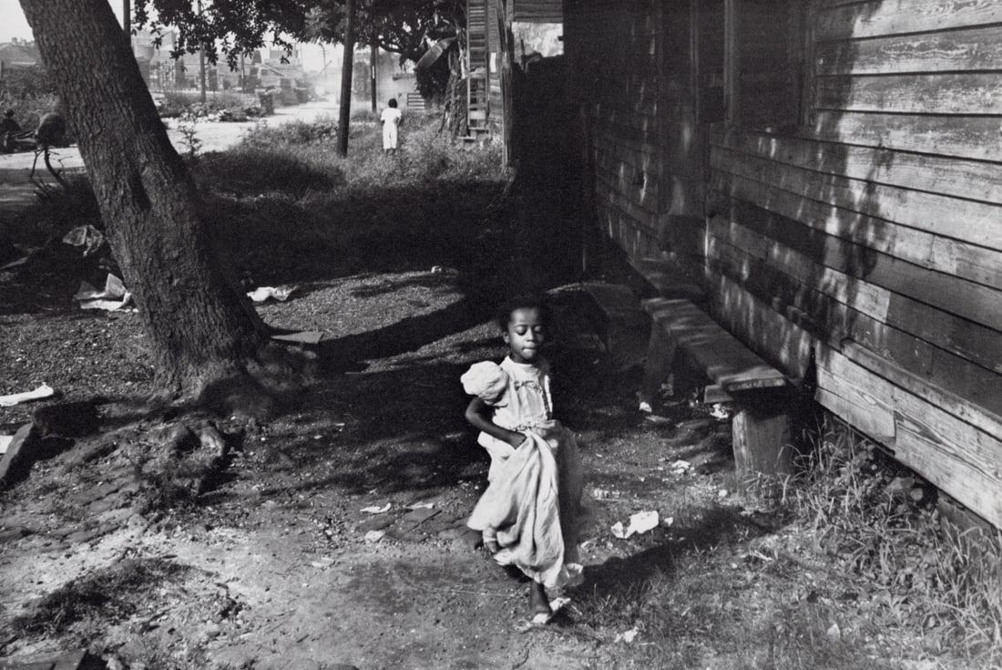 HENRI CARTIER-BRESSON - New Orleans, 1947: Artist: Henri Cartier-Bresson Title: New Orleans, 1947 Medium: Photo Litho, 1979, USA Dimensions: 10.35x6.9" Description: Heat Wax Mounted on 11x14" Conservation Board Artist Bio: Henri Cartier-Bresso