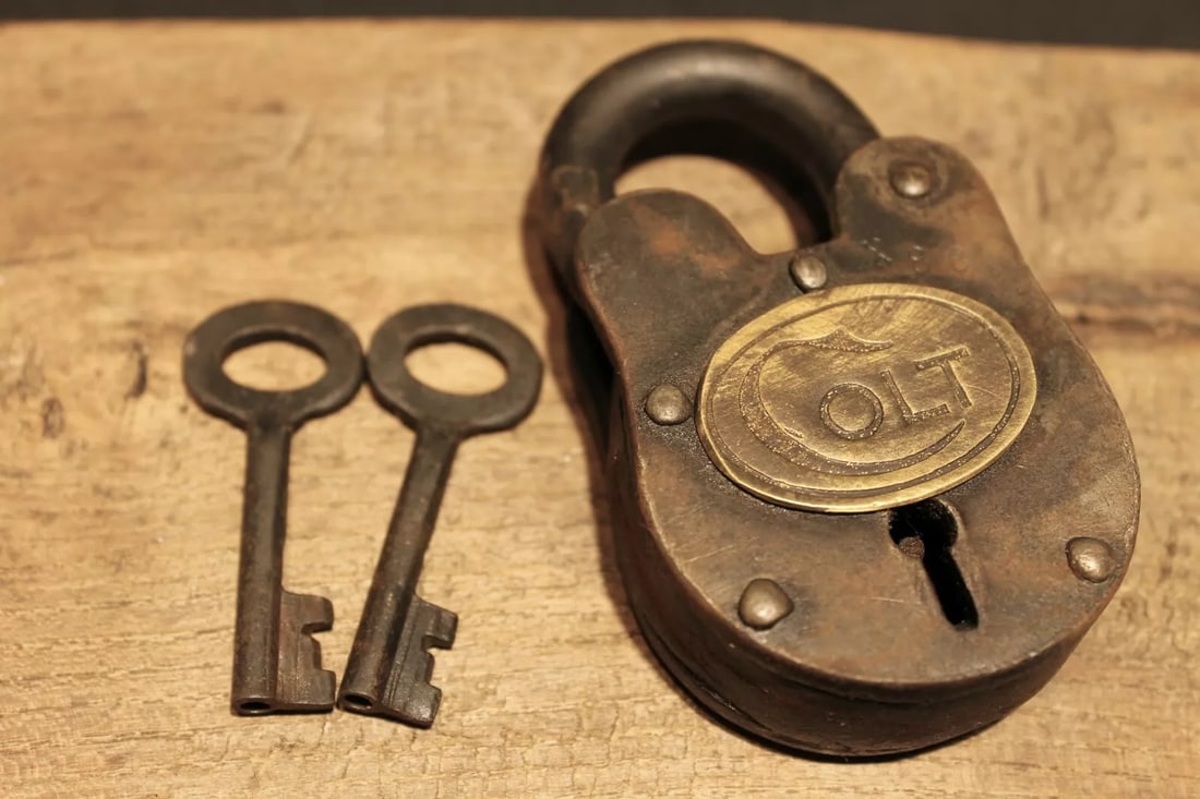 Colt Firearms Ammo Box Padlock Lock & Key: 3 3/4" tall x 2 1/8" Wide Nice reproduction cast iron Colt padlock! This lock is fully functional! Hard to tell its age. Heavy iron and brass. Great aged patina throughout. Limited quantity available!