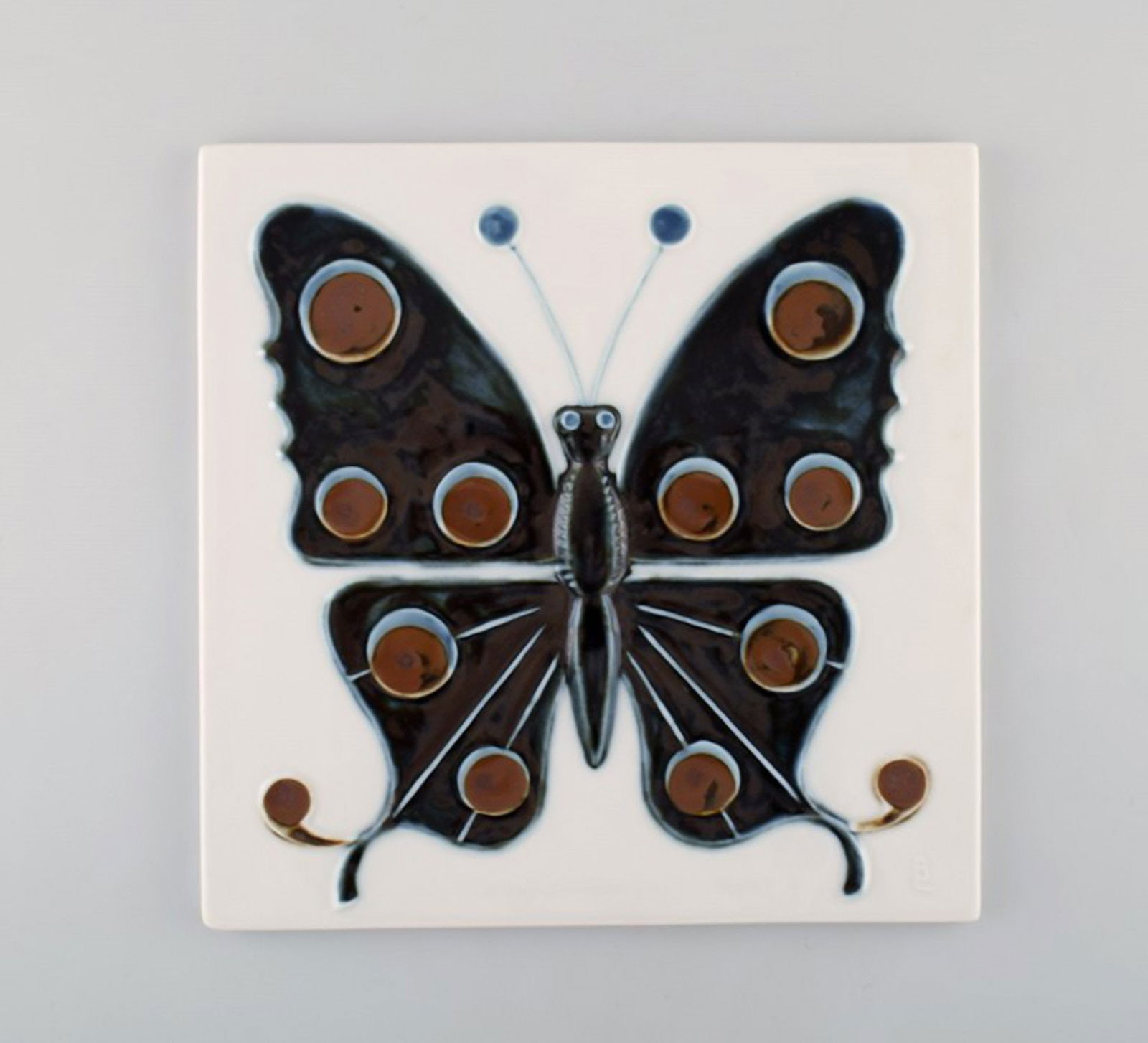Bertil Lundgren for Rörstrand. "Gallery 2" wall plaque in glazed porcelain with butterfly.: Bertil Lundgren for Rörstrand. "Gallery 2" wall plaque in glazed porcelain with butterfly. 1970s. In very good condition. Measures: 25 x 25 cm. Stamped. Reserve: $175.00 Shipping: Domestic: Shipp