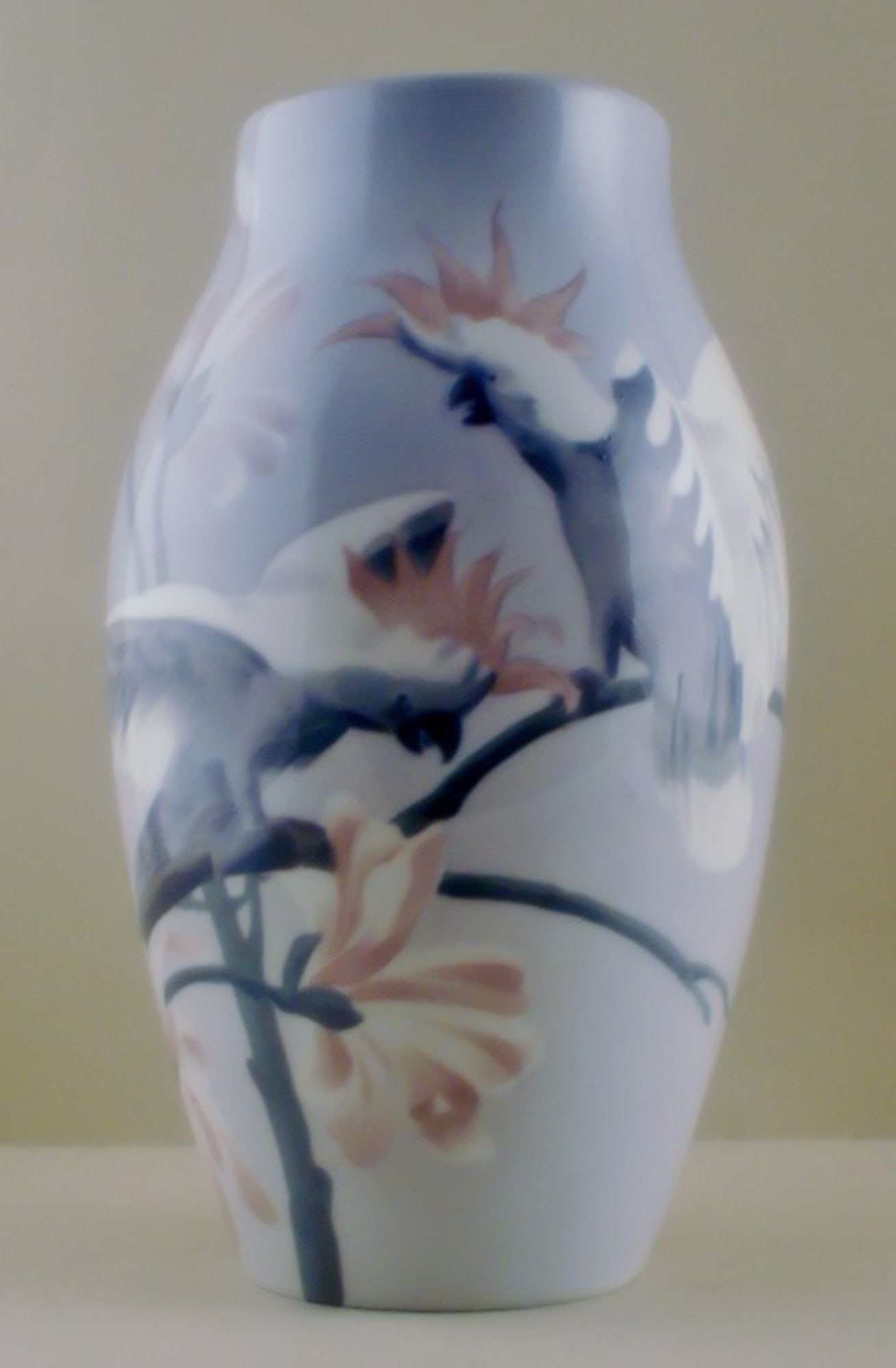 Karl Lindström (1865-1936) for Rorstrand.: Karl Lindström (1865-1936) for Rorstrand. Unique Art Nouveau vase in porcelain decorated with parrots. Stamped. Perfect condition. Measures: 32.5 x 19 cm. Reserve: $875.00 Shipping: Domestic: Shi