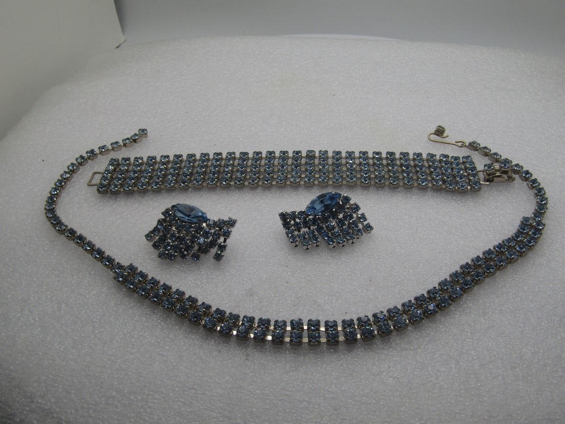 Vintage Coro Blue Rhinestone Necklace Set, Bracelet, Earrings Set, 1940's-1950's: Vintage Coro Blue Rhinestone Necklace Set, Bracelet, Earrings Set, 1940's-1950's. Silver tone with a 15" necklace with a double row of 4mm blue rhinestones in the center and a single on the end. The h