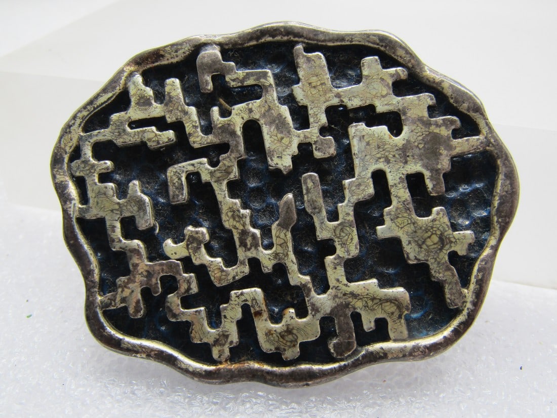 Vintage Coro Abstract/Brutalist Brooch, 1960's Sterling or Plated & Enameled: Vintage Coro Abstract/Brutalist Brooch, 1960's Sterling or Sterling Plated. & Enameled. This is an abstract shadowbox design with a gunmetal blue enameld hammere background and an overlay of freeform