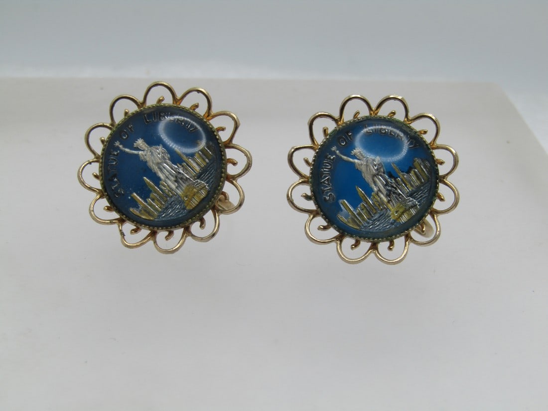Vintage Coro Statue of Libery Earrings, Screwback, 1950's-1960's: Vintage Coro Statue of Libery Earrings, Screwback, 1950's-1960's. Blue background with Silver Tone Statue of Libery, Skyline, and State of Liberty wordding. domed glss covering - gold tone open scallo
