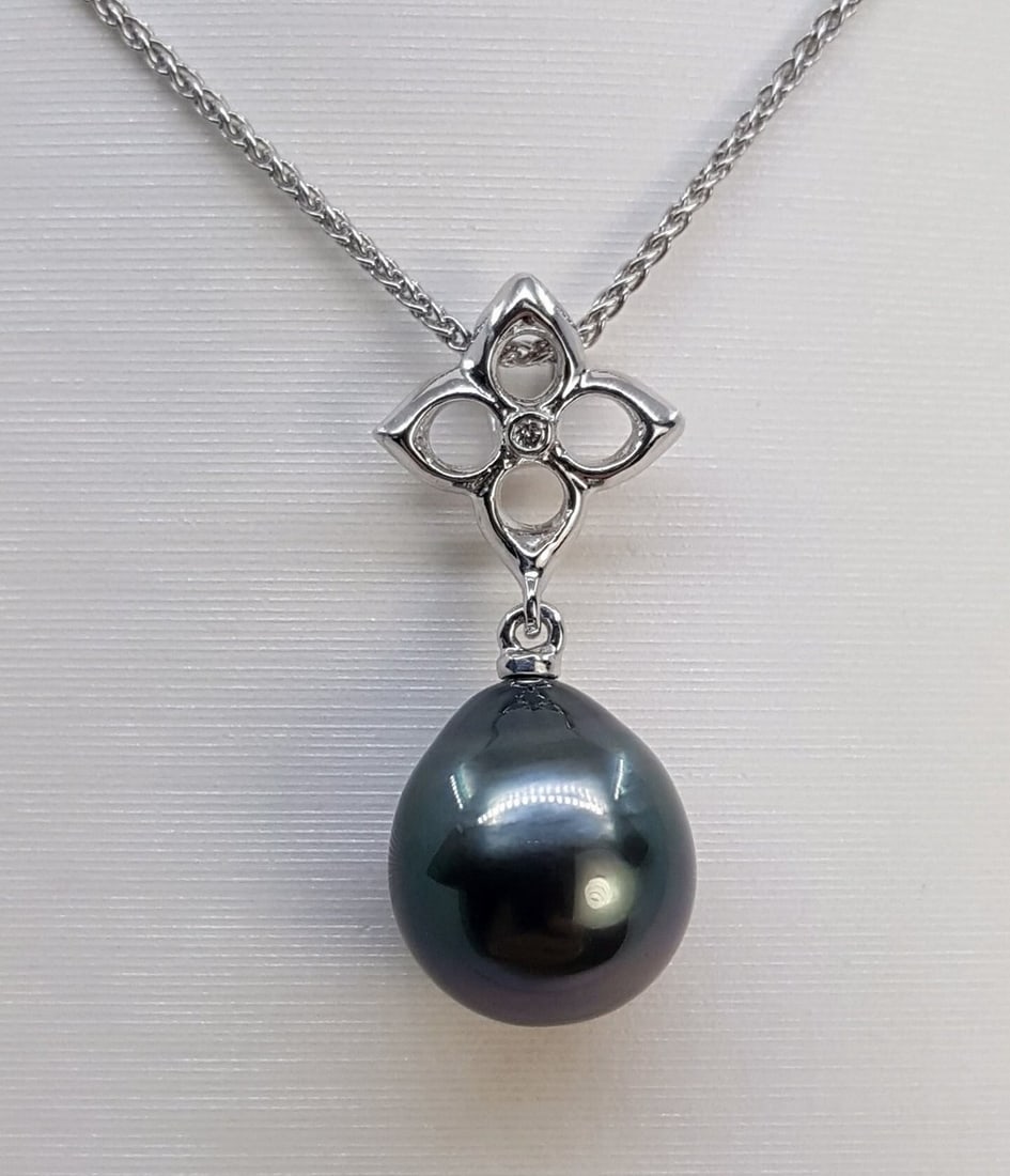 Pendant - 14 kt. White gold - 0.01ct. tw. - 10x11mm Tahitian Pearl: Title: Pendant - 14 kt. White gold - 0.01ct. tw. - 10x11mm Tahitian Pearl Description: Emerging from the tropical lagoons of French Polynesia, this pearl has been selected for its natural remarkable g