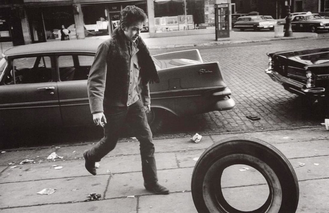 JIM MARSHALL - Bob Dylan, NYC, 1963: Artist: JIM MARSHALL Print Title: Bob Dylan, NYC, 1963 Printing Date: 1990’s Medium: Duotone Photo-lithograph Printed in: Italy Image Size: approx. 5 x 8” Jim Marshall1936– 2010) was