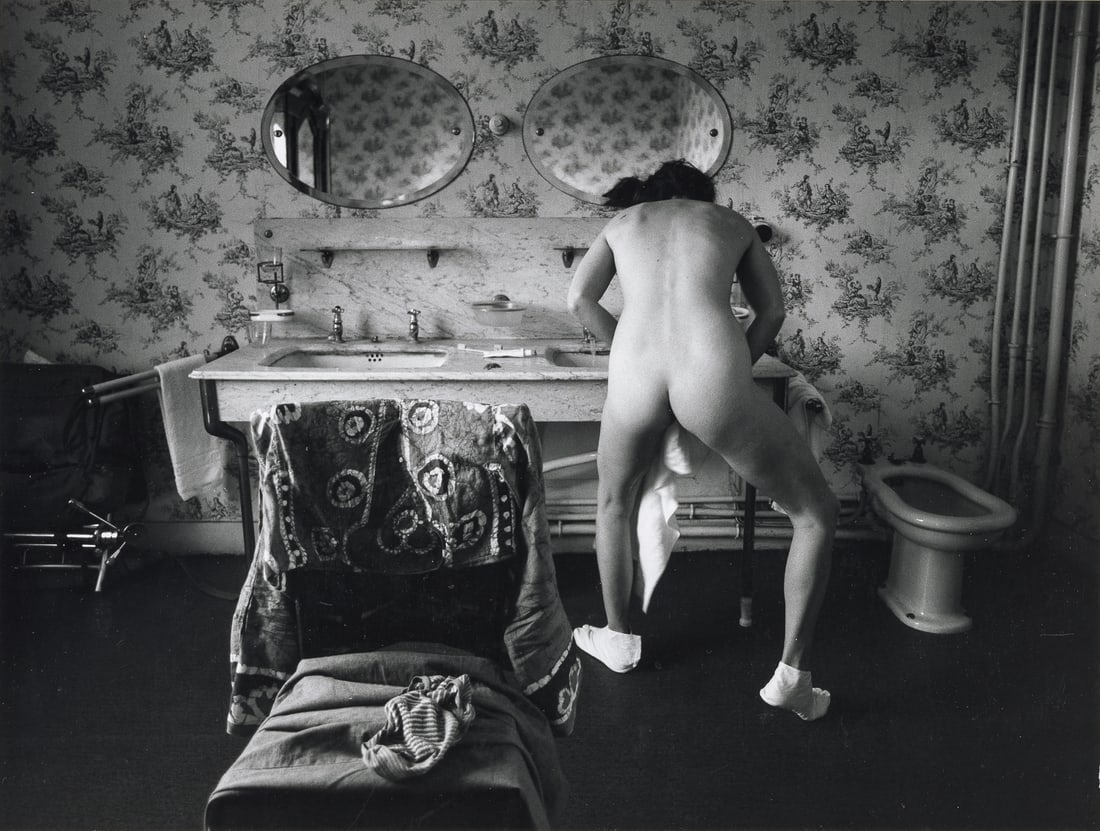 JACK WELPOTT - Elle Se Lave, Brussels, 1973: Artist: Welpott, Jack Title: Elle Se Lave, Brussels, 1973 Medium: Gelatin Silver Dimensions: 9x12" on 14x17" mat Description: Signed in pencil recto on the mount, signed, titled, dated and annotated 7