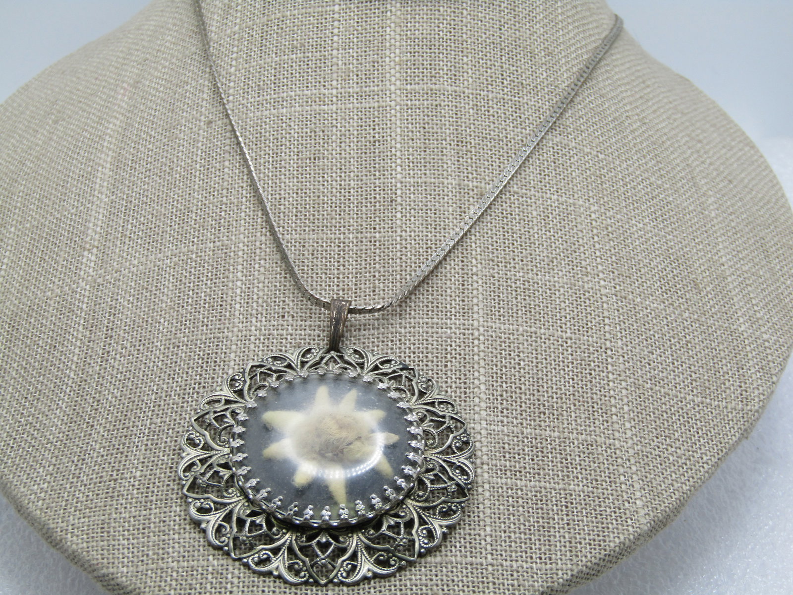 Vintage Edelweiss Filigree Necklace, 18" Chain, 1940's-1970's: Vintage Edelweiss Filigree Necklace, 18" Chain, 1940's-1970's. The chain is an Slink that is slightly over 1mm wide. This is newer than the pendant. Signed with a hang tag with an M (may be Monet). Th