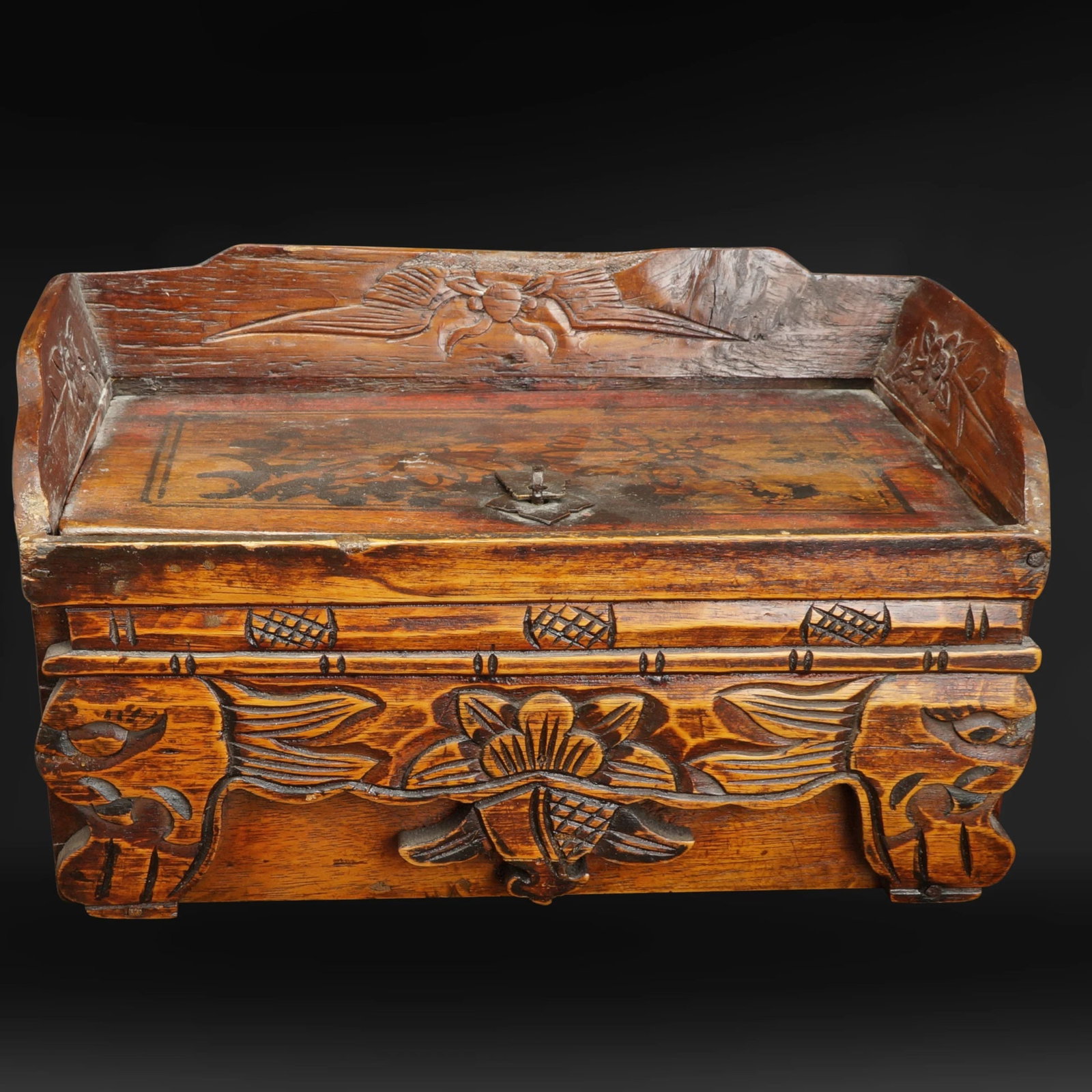 Vintage Handmade Sino-Tibetan Carved Wood Dresser Box: Title: Vintage Handmade Sino-Tibetan Carved Wood Dresser Box Size: 10 1/8 in (25.7 cm) wide x 6 in (15.2 cm) deep x 5 ½ in (14.0 cm) tall. Description:A vintage hand-carved and hand painted woo