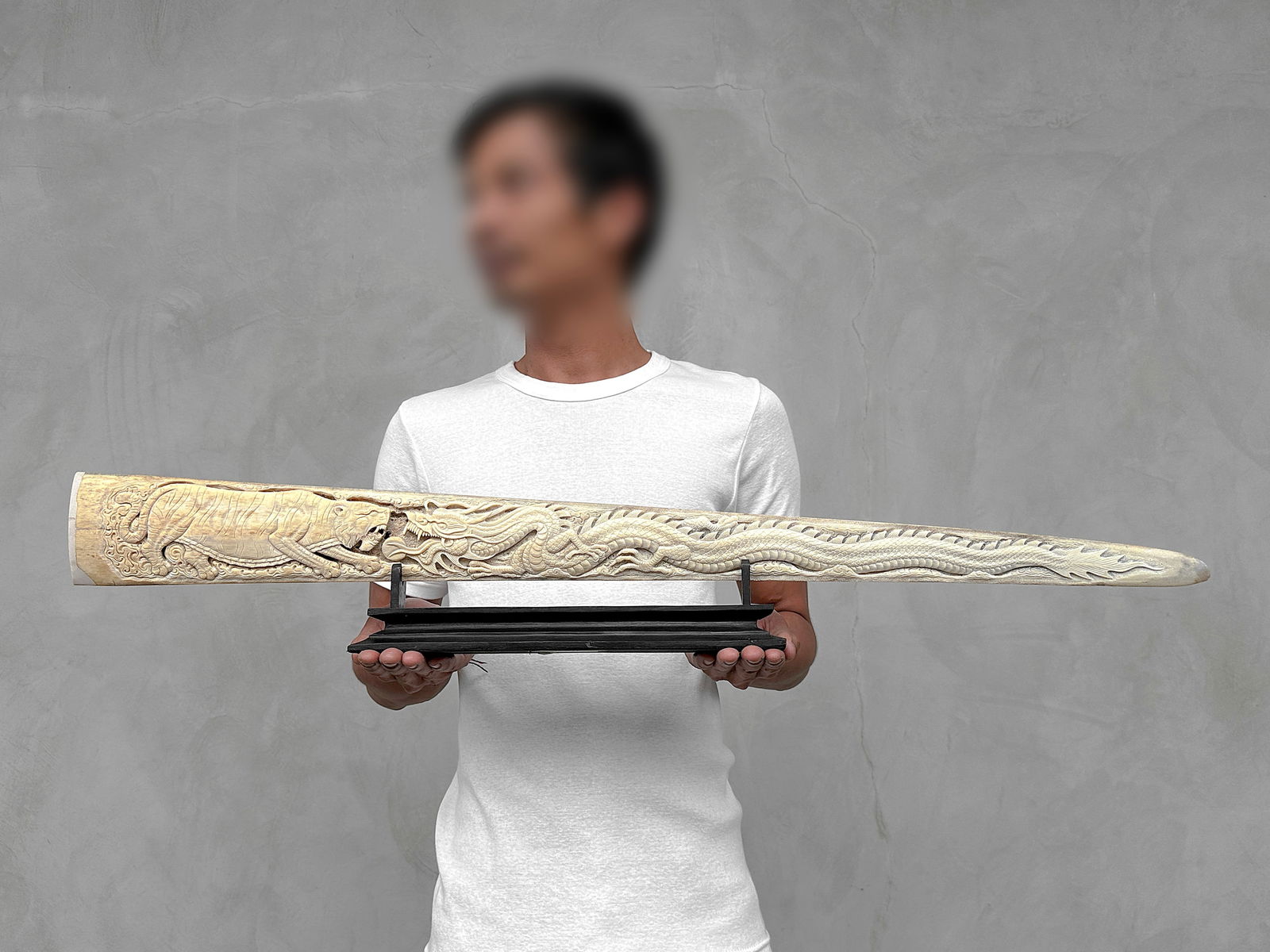 Large carved swordfish rostrum - Dragon tiger motif: Title: Large carved swordfish rostrum - Dragon tiger motif Maker: Unknown Origin:Indonesia Date/Period:2024 Materials:Xiphias Gladius, Bone, wood DimensionsLength: 89 cm / 35 inches Description:A very