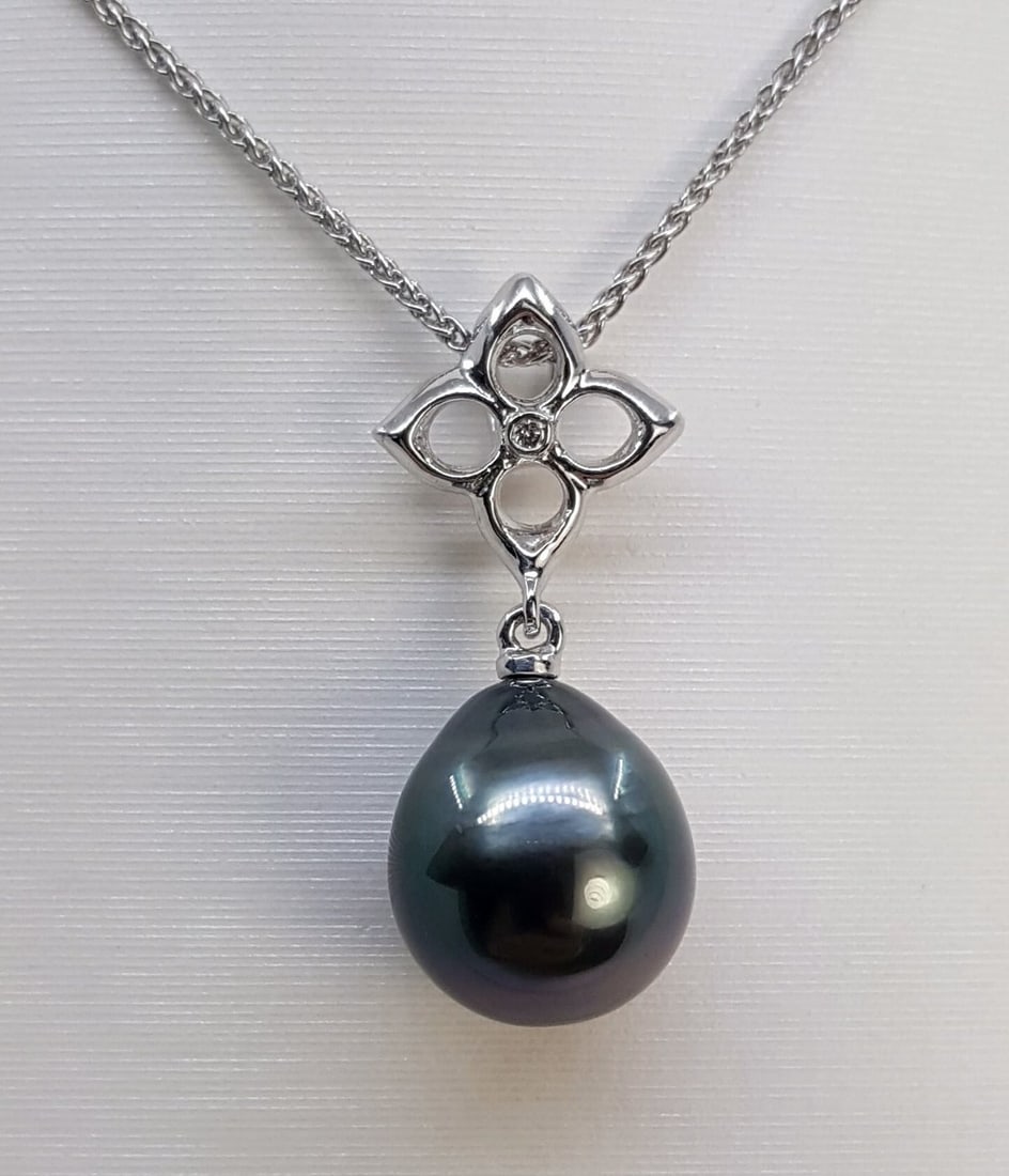 Pendant - 14 kt. White gold - 0.01ct. tw. - 10x11mm Tahitian Pearl: Title: Pendant - 14 kt. White gold - 0.01ct. tw. - 10x11mm Tahitian Pearl Description: Emerging from the tropical lagoons of French Polynesia, this pearl has been selected for its natural remarkable g