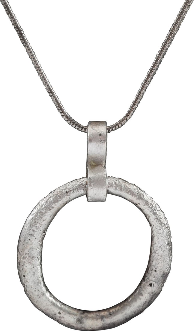 CELTIC PROSPERITY RING NECKLACE, ENGLAND C.400-100 BC: Before the Roman invasion of the British Isles, rings of bronze, silver, and gold were used as a means of exchange, particularly in Ireland. Most exchanges of goods and property were conducted by bart
