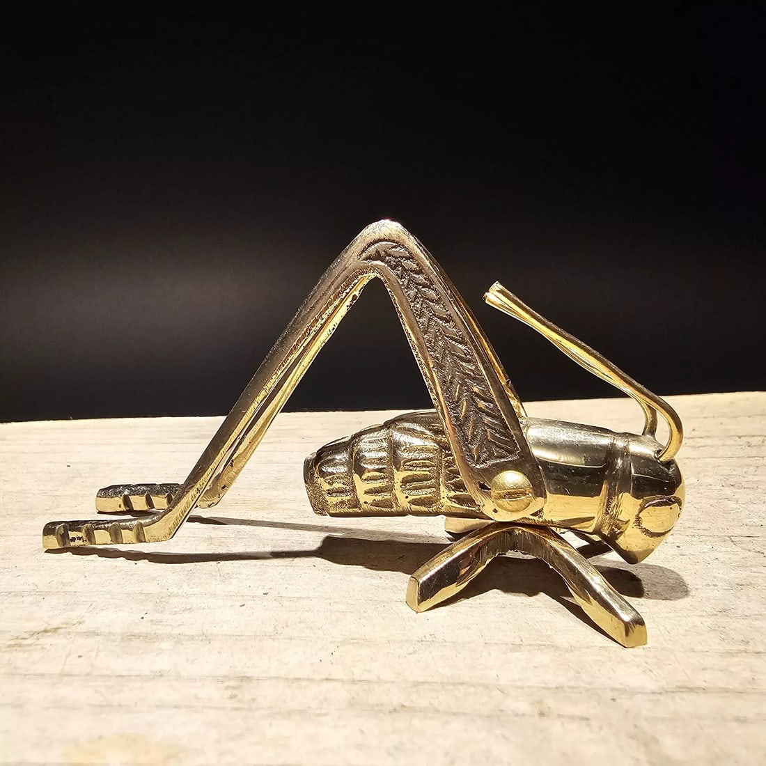 Good Luck Solid Brass Fireplace Hearth Cricket: 3 1/2" Long 1 1/8" Wide 2" Hide Wonderful antique style brass hearth cricket. Many times found on the hearth crickets are said to bring good luck and fortune to ones house and home. Nice detail and qu