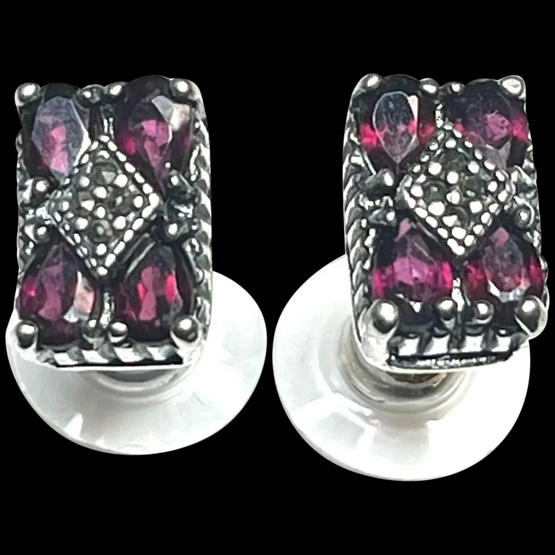 Vintage Sterling Silver Garnet and Marcasite Earrings: Title: Vintage Sterling Silver Garnet and Marcasite Earrings Description: Vintage Sterling Silver Garnet and Marcasite Earrings Garnet/Sterling Silver Weighs 3 gram Pierced Closure Measures Approx. .5