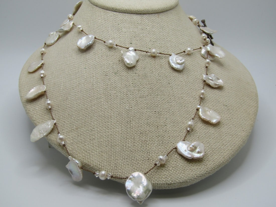 Sterling Margo Morrison Baroque Pearl Necklace, 34": Sterling Margo Morrison Baroque Pearl Necklace, 34". The pearls are flat baroque freshwater pearls that are appx. 1/2" to 5/8" wide and up to 3/4" long with their baroque bumps and rounded irregularti