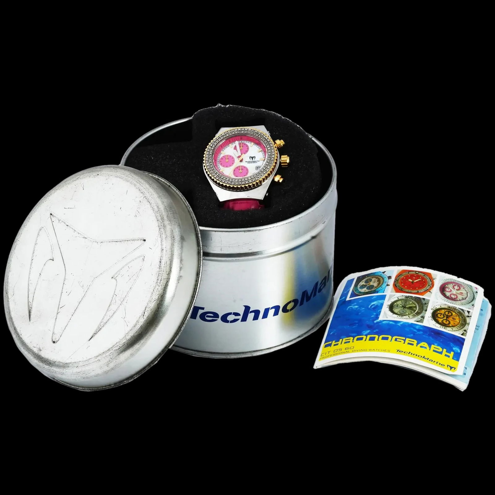 Vintage Pink Technomarine Womens Chronograph Wristwatch Diamonds + MOP Dial: A vintage womens stainless steel chronograph wristwatch by TechnoMarine. Millenium Special Edition, Cruise CG7, model CIT 05 60. The bezel is set with two rows of diamonds. Three gilt crowns. Mother-o