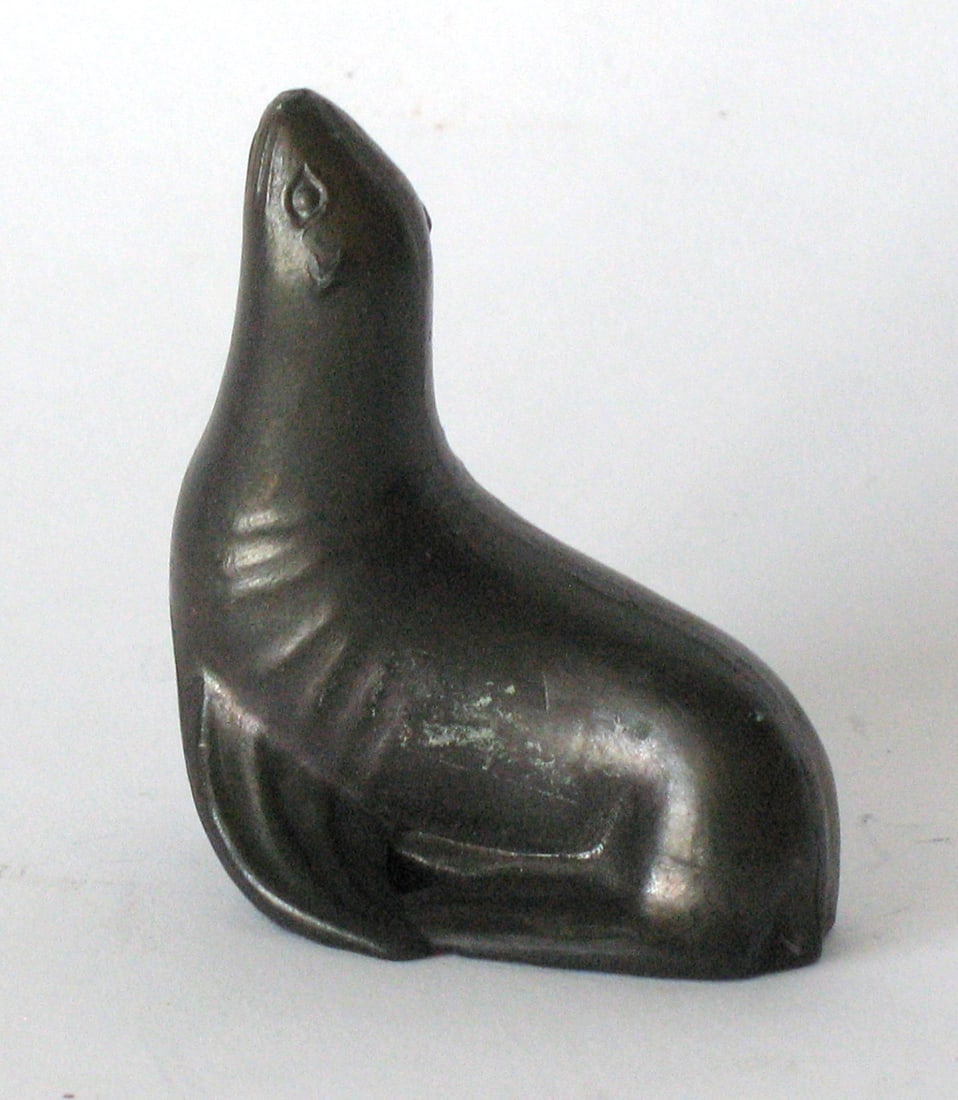 Vintage cast metal seal paper weight. (1 of 4)