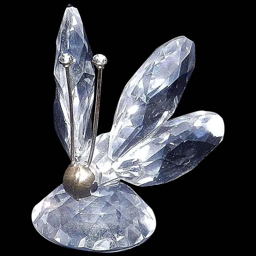 Vintage Swarovski Silver Crystal Butterfly Figurine 1990’s: A beautiful Swarovski Silver Crystal butterfly figurine in mint condition. No longer has the box hence the reduction in price. Measures approximately 1 ½” x 1 ¼” x 1 ¼”