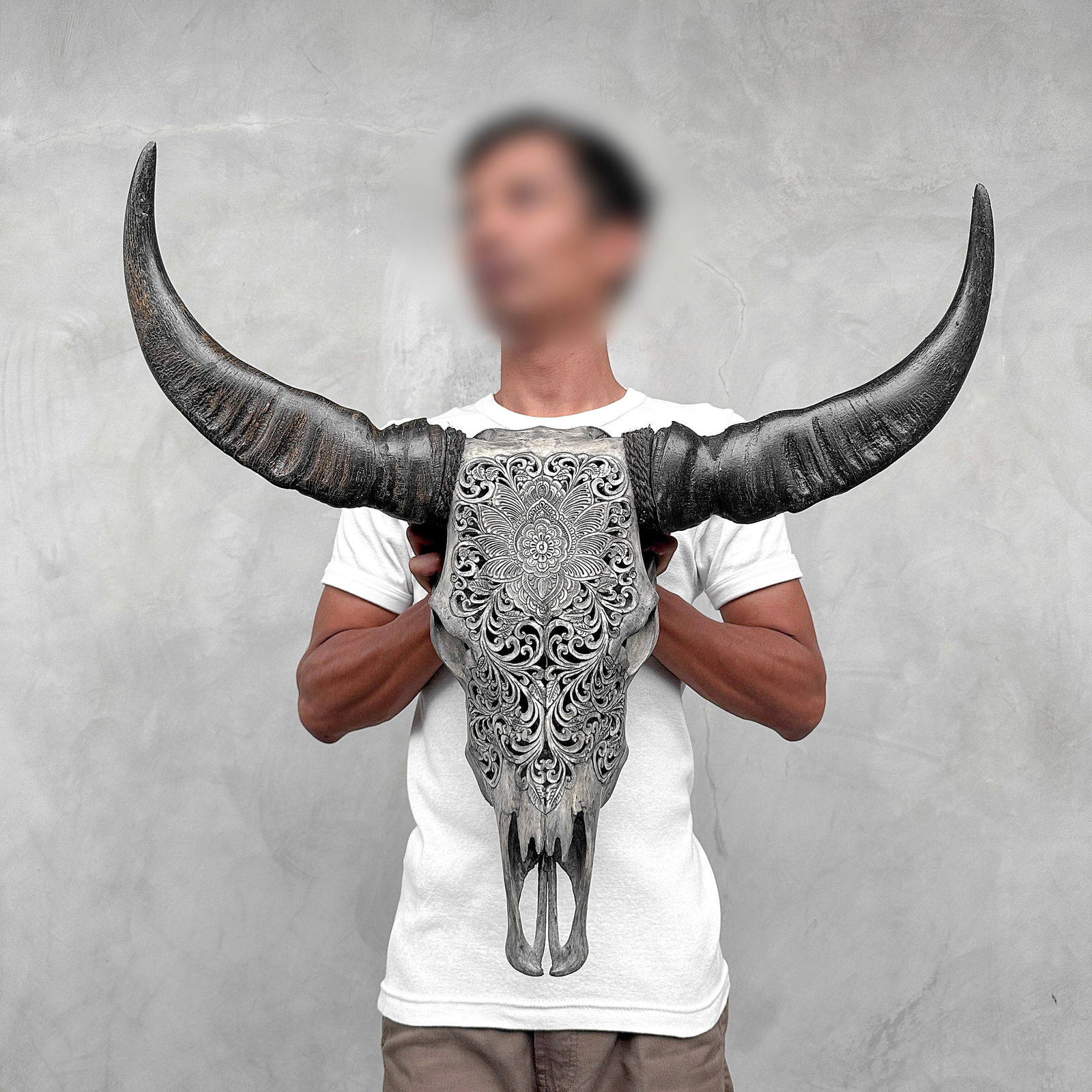 Grey buffalo skull - Floral motif: Title: Grey buffalo skull - Floral motif Maker: Unknown Origin:Indonesia Date/Period:2024 Materials:Bubalus Bubalis, bone, horn Dimensions:Height: 62 cm / 24.4 inches. Length: 68 cm / 26.7 inches Desc