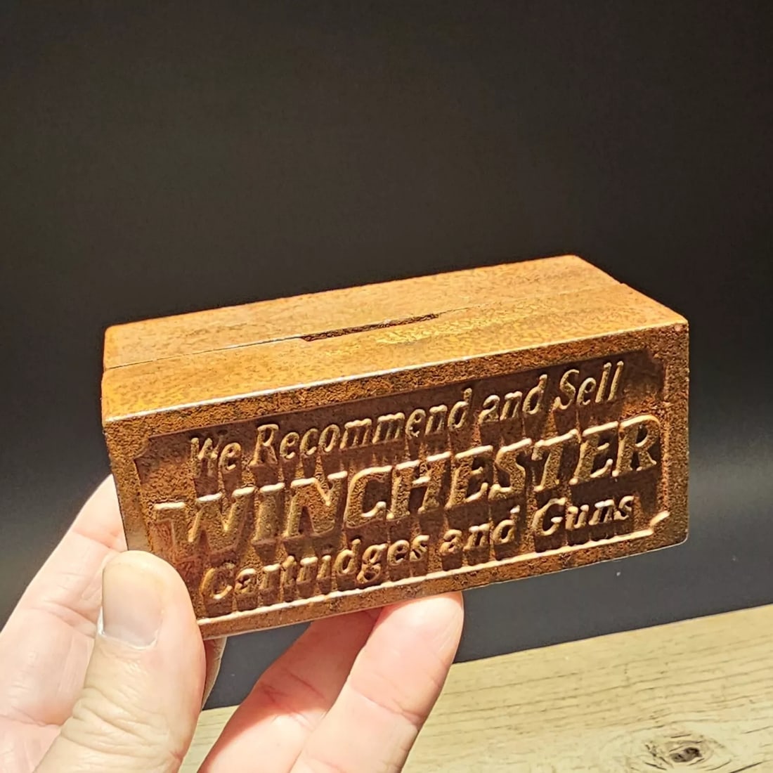 Cast Iron Winchester Coin Bank: 4 3/8" long x 1 7/8" Tall A wonderful reproduction cast iron collectible advertising Winchester coin bank. Advertising pieces like this many times were given to shops or used as sales samples. Such a 