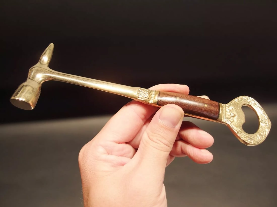Bottle Cap Opener w Ice Breaking Hammer & Pick: 7 1/2" Long Great antique reproduction ice hammer bottle opener combo. Was made to look just like an antique, but is actually new. Great for use or display! All our items come with a 100% customer sat