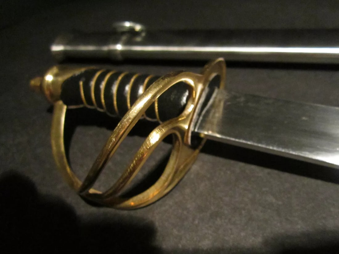 26" Small Cavalry Civil War Carbon Steel Sword: 26" Long with scabbard 28" 3" Grip 2 lb 1 oz Nice reproduction of a small 1960 saber solid brass carbon steel blade steel scabbard. . Please note the 3" handle is made for smaller hands. Please see al