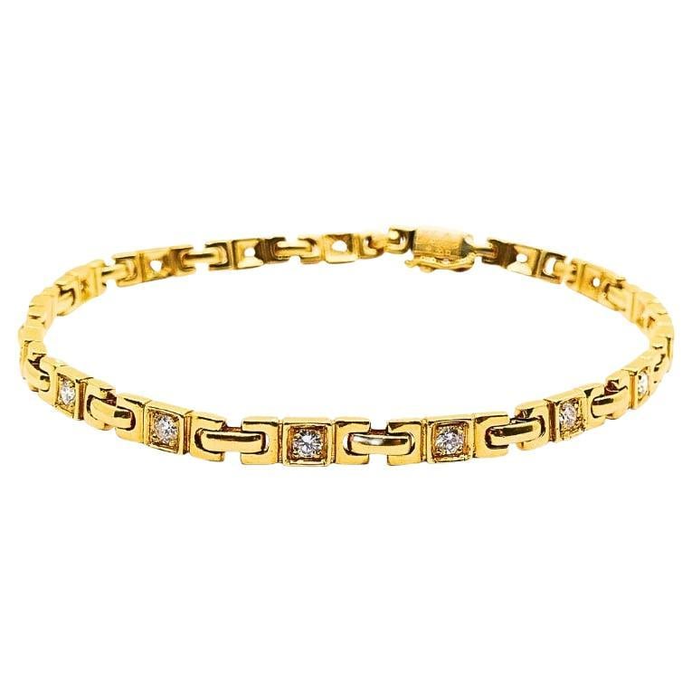 Van Cleef & Arpels 18K Gold Diamond Bracelet: About the Item The Van Cleef & Arpels 18k Yellow Gold Bracelet is a hallmark of elegance and craftsmanship. This luxurious piece featuring: 18k yellow gold; French contemporary style; 17 round brillia