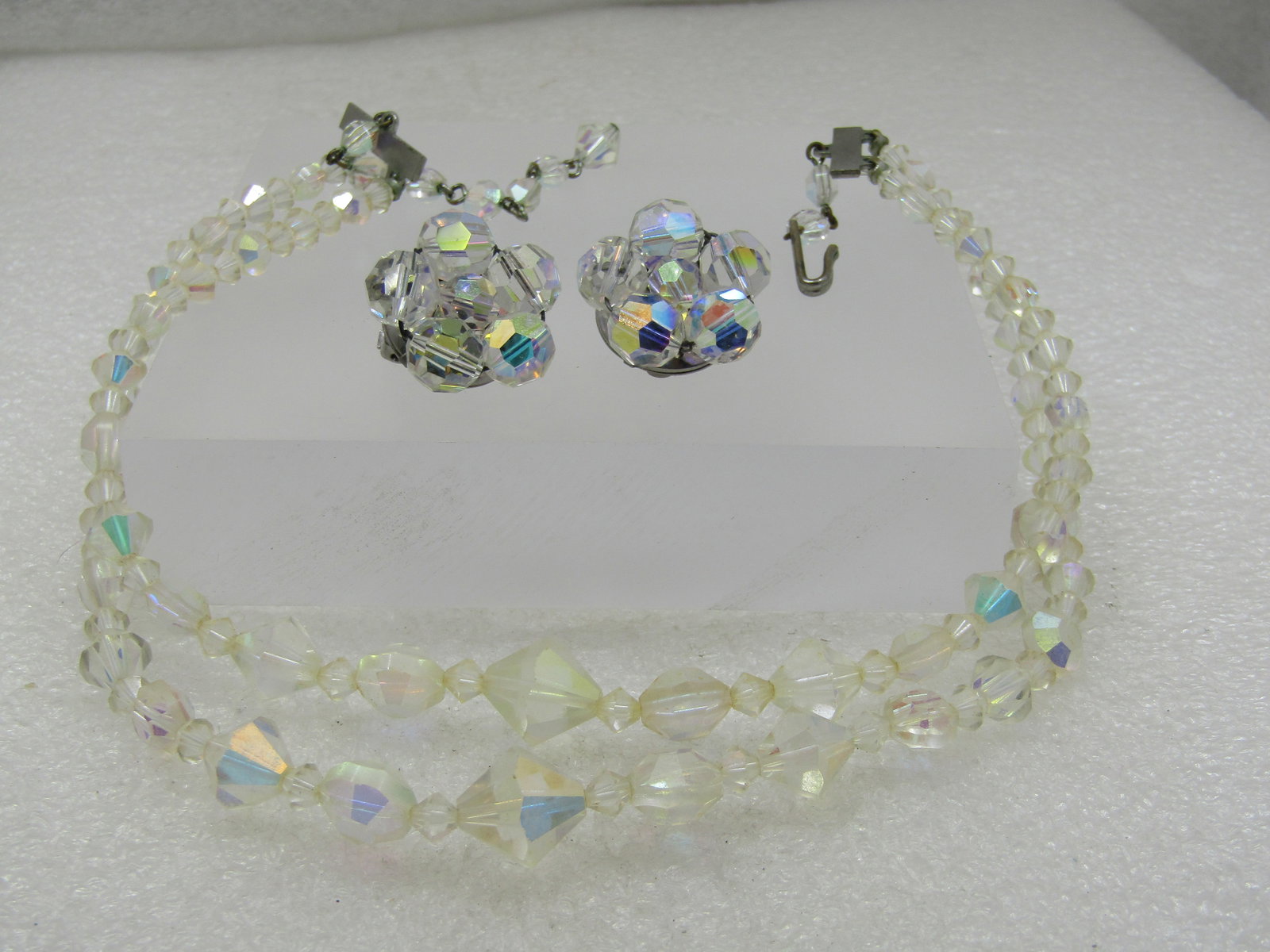 Vintage Double Strand Aurora Borealis Neckace & Earrings Demi Parure, Mid-Century, Elco: Vintage Double Strand Aurora Borealis Neckace & Earrings Demi Parure, Mid-Century, Elc. Silver tone end bars to the double strands of aurora borealis crystal beads that are in a diamond faceted shape