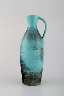 Richard Uhlemeyer, German ceramist. Pottery pitcher, beautiful crackled glaze in green red shades.: Richard Uhlemeyer, German ceramist. Pottery pitcher, beautiful crackled glaze in green red shades. Germany, 1950 s. Measures 28 cm. x 10 cm. In perfect condition. Stamped. Reserve: $294.00 Shipping: D